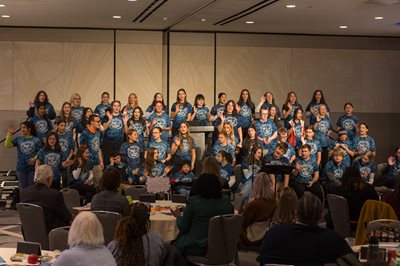 Image of High Five Choir performing at IASB Equity Immersion event